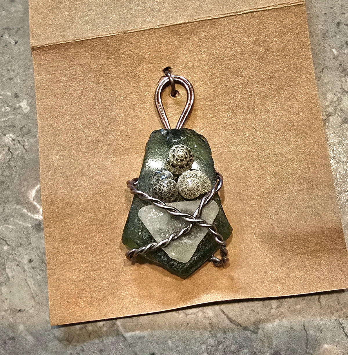Green sea glass pendant with shells