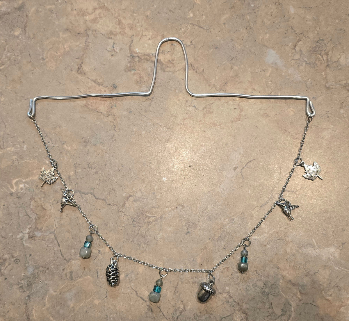 Rear view mirror hanger with charms