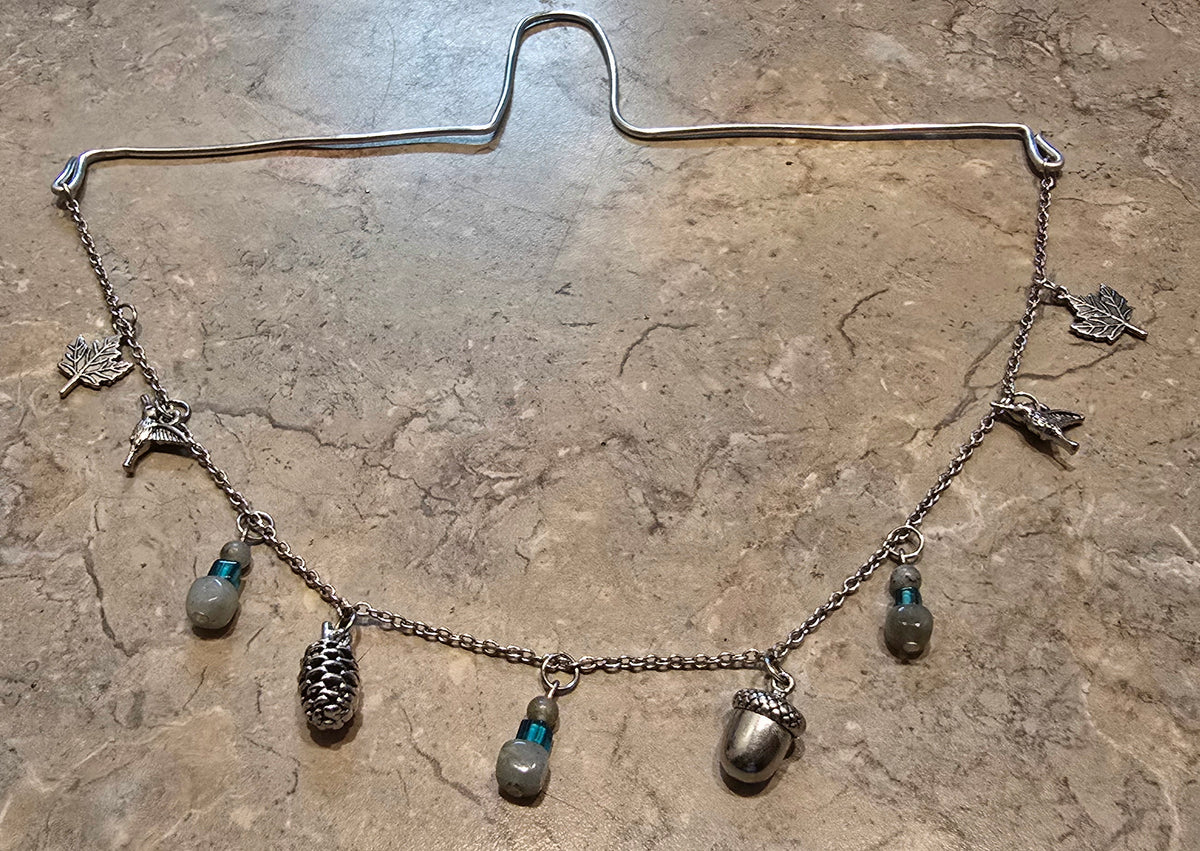 Rear view mirror hanger with charms